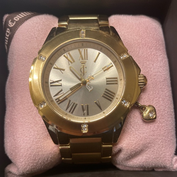 Beautiful timeless gold Juicy couture watch on a Movado band. - Picture 2 of 3